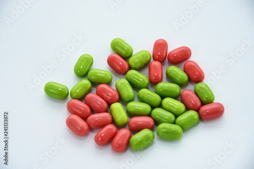 red, green,vitamin pills,candy,Drops