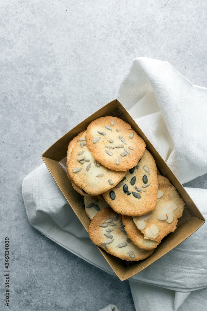 Homemade cat's tounge cookies with milk on marble background. Langues de chat. Homemade cat's tounge cookies with milk on marble background. Langues de chat.