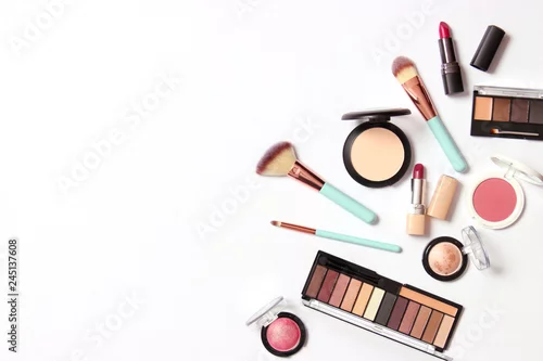 Obraz professional makeup tools. Products for makeup on a white background top view. A set of various products for makeup.