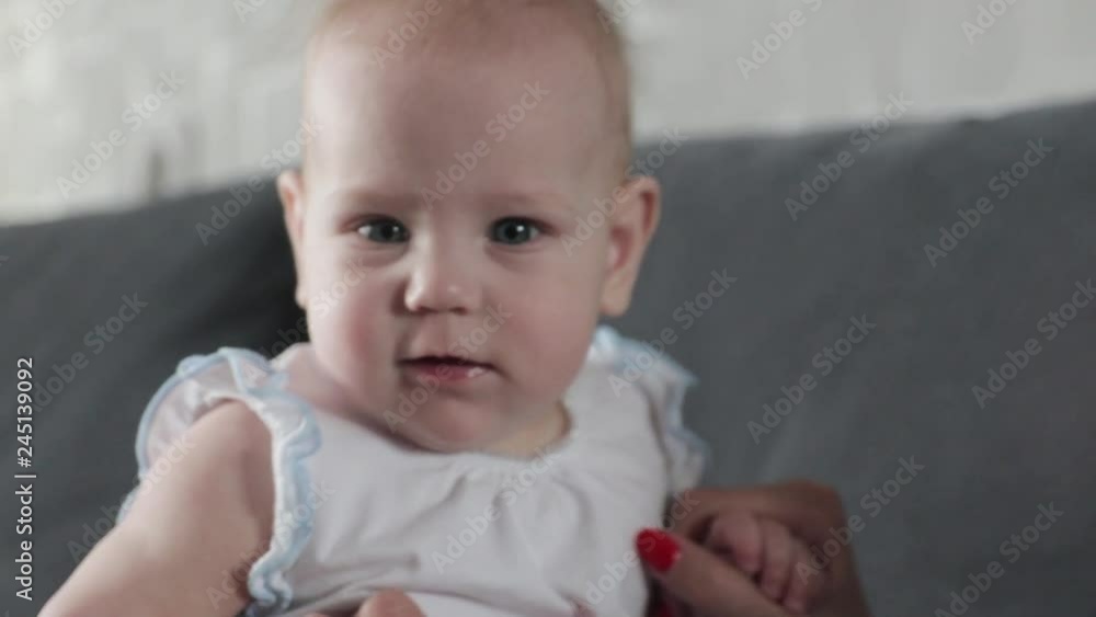 Baby looking into camera and laughing Baby looking into camera and laughing