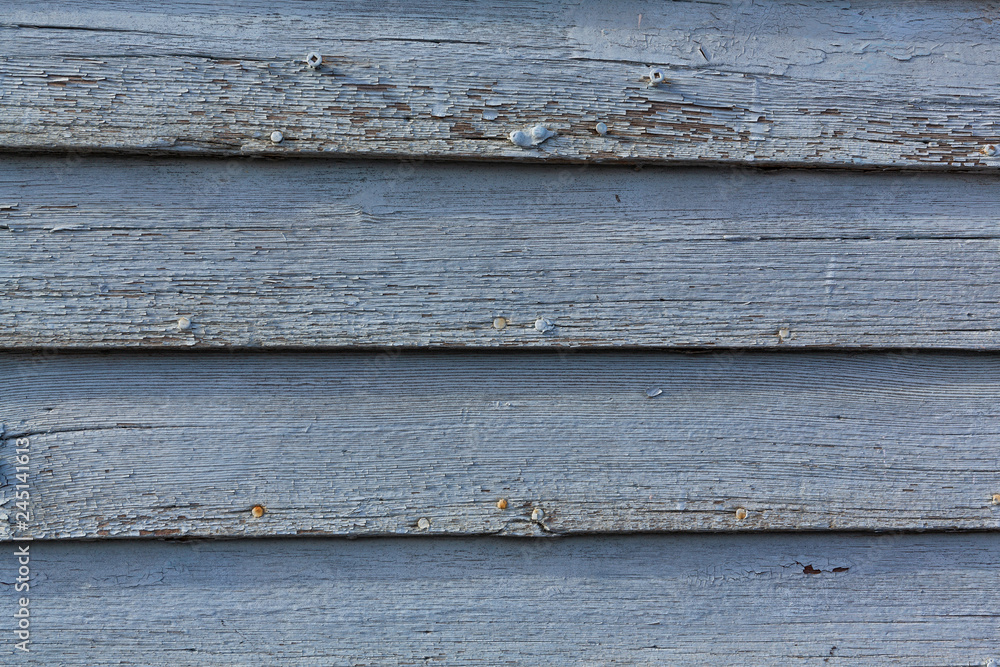 Peeling blue painted wood wall Peeling blue painted wood wall