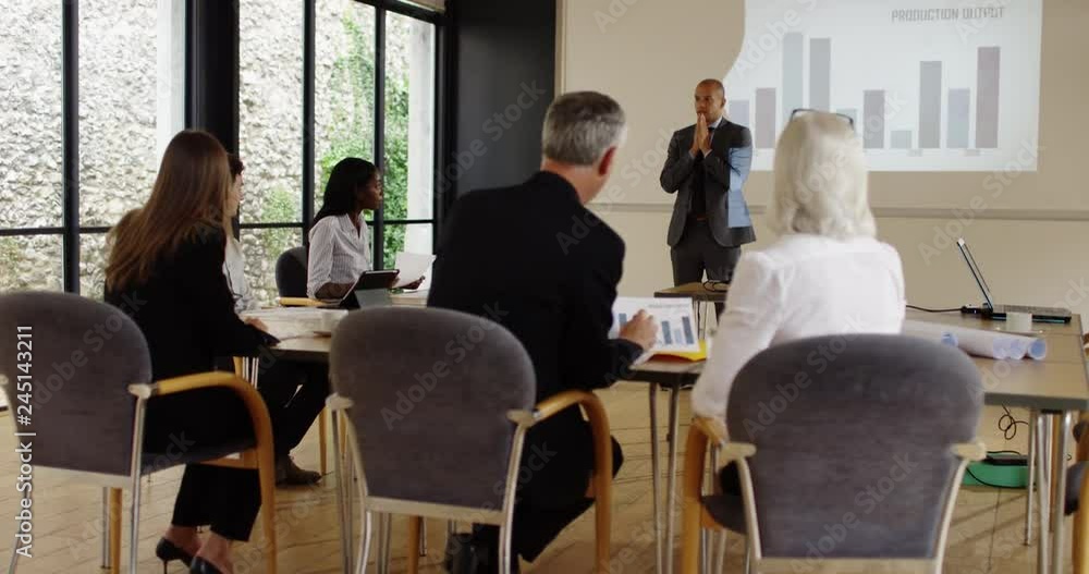 4K Businessman presenting data analysis in a meeting & answering questions 4K Businessman presenting data analysis in a meeting & answering questions