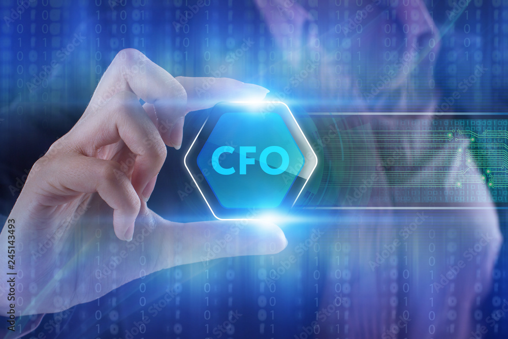 The concept of business, technology, the Internet and the network. A young entrepreneur working on a virtual screen of the future and sees the inscription: CFO The concept of business, technology, the Internet and the network. A young entrepreneur working on a virtual screen of the future and sees the inscription: CFO