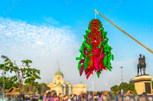 colorful of flying paper model tradition Thai handmade in the equestrian courtyard inside Un Ai Rak Khlai Khwam Nao festival in Bangkok. photo