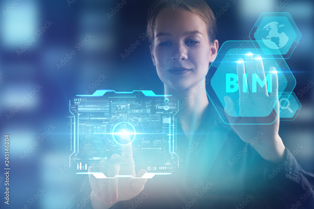 The concept of business, technology, the Internet and the network. A young entrepreneur working on a virtual screen of the future and sees the inscription: BIM The concept of business, technology, the Internet and the network. A young entrepreneur working on a virtual screen of the future and sees the inscription: BIM