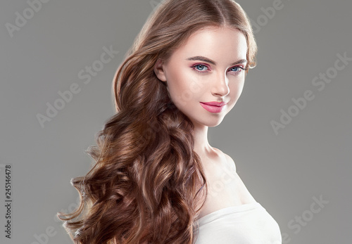 Beautiful hair woman long brunette hairstyle female healthy skin beauty makeup cosmetic concept