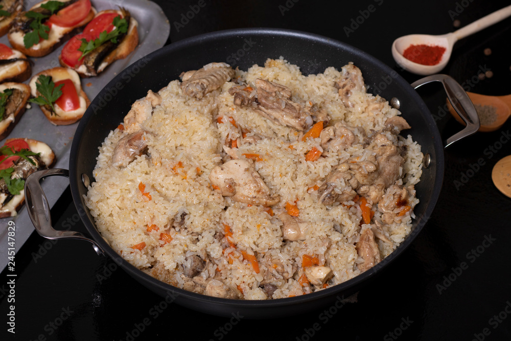 ready meal to eat, asian food into cauldron and spices,top view ready meal to eat, asian food into cauldron and spices,top view