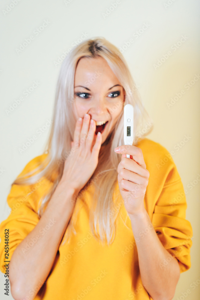 Happy girl with a thermometer and a temperature of 36.6. Happy girl with a thermometer and a temperature of 36.6.
