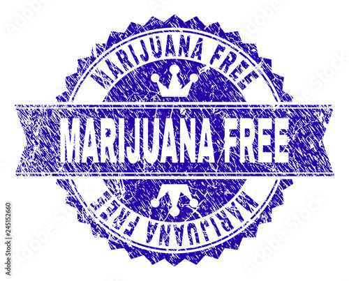 MARIJUANA FREE rosette seal imitation with grunge style. Designed with round rosette, ribbon and small crowns. Blue vector rubber print of MARIJUANA FREE text with grunge style.
