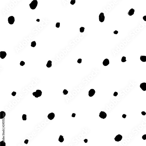 Simple hand drawn black and white pattern with brush ink dots