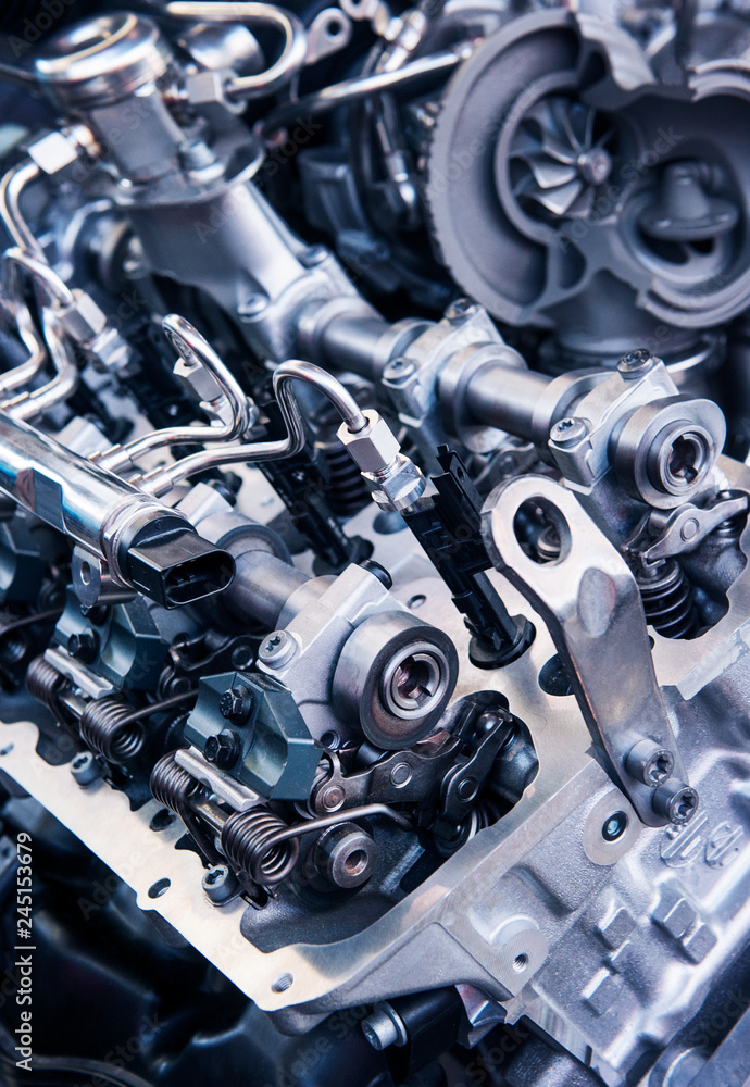 Close up shot of car engine. Automobile accessories concept. Internal design of engine. Close up shot of car engine. Automobile accessories concept. Internal design of engine.