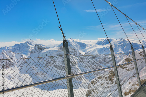 View from the suspension bridge along the cliff of Mt. Titlis in Switzerland in winter
