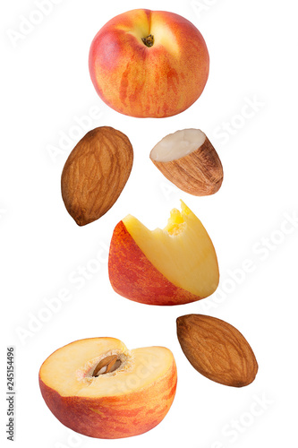 Flying peach fruits isolated on white background