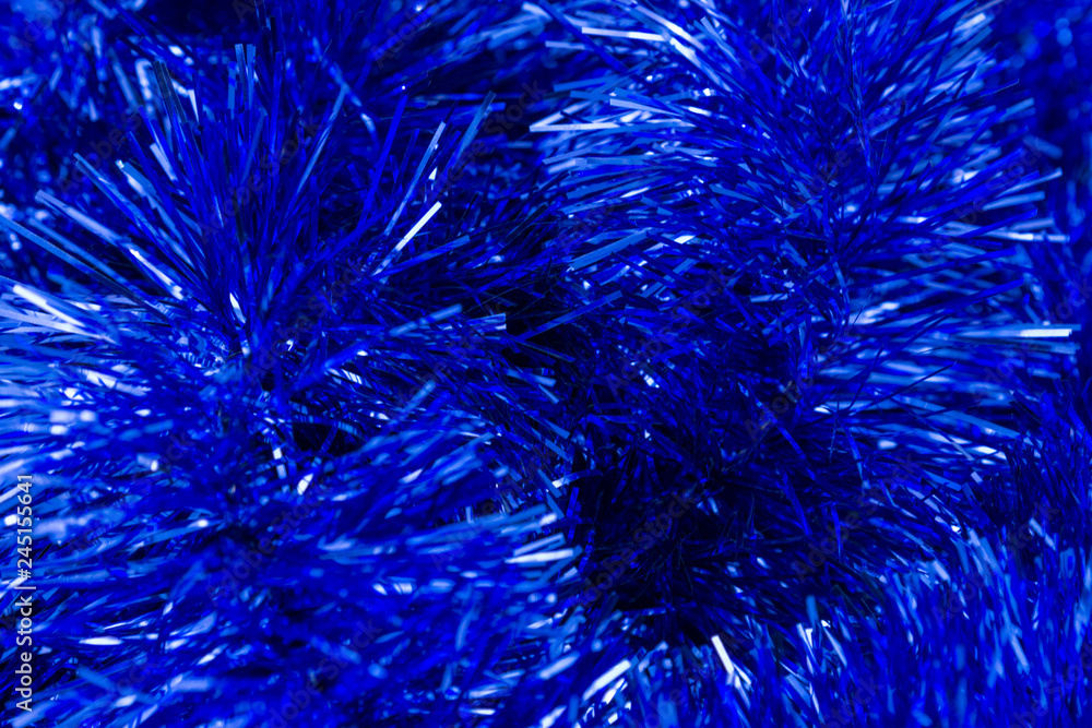 Blue tinsel closeup background texture Blue tinsel closeup background texture
