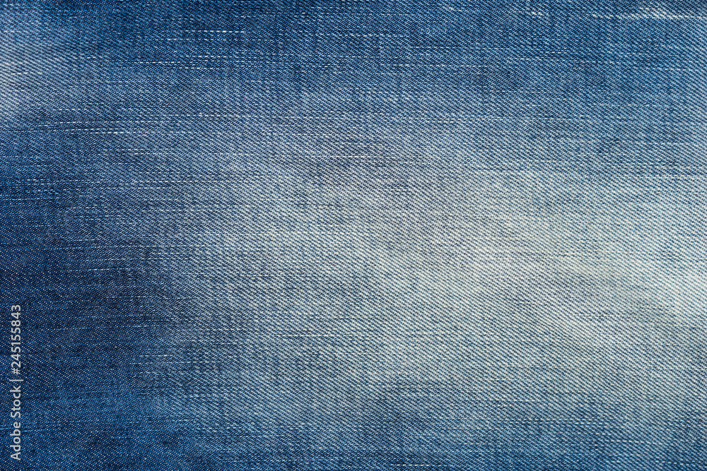 Faded blue jeans texture background Faded blue jeans texture background