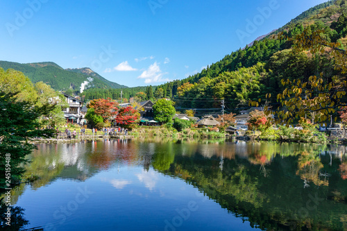 Yufuin, Oita, Japan - November 1 2017 : The Kinrin Lake with Mount Yufu in Background and blue sky with clouds in autumn. onsen town, Yufuin, Oita, Kyushu, Japan