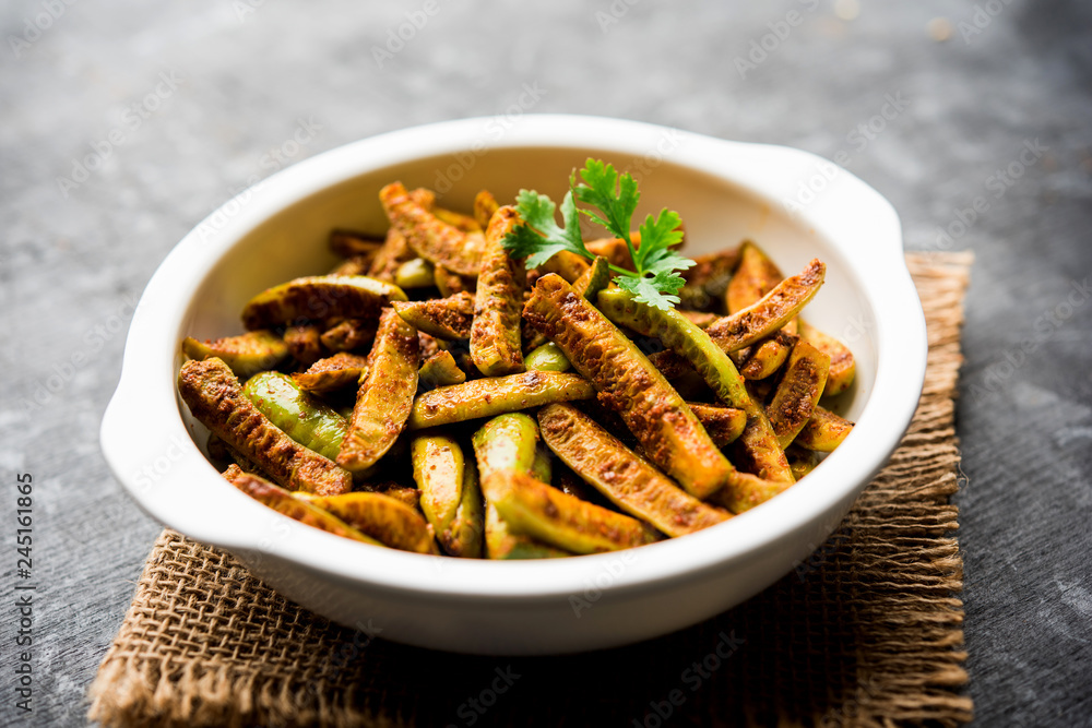 Tindora Sabzi / Tendli / tondli Fry also known as Ivy Gourd fry recipe. selective focus Tindora Sabzi / Tendli / tondli Fry also known as Ivy Gourd fry recipe. selective focus