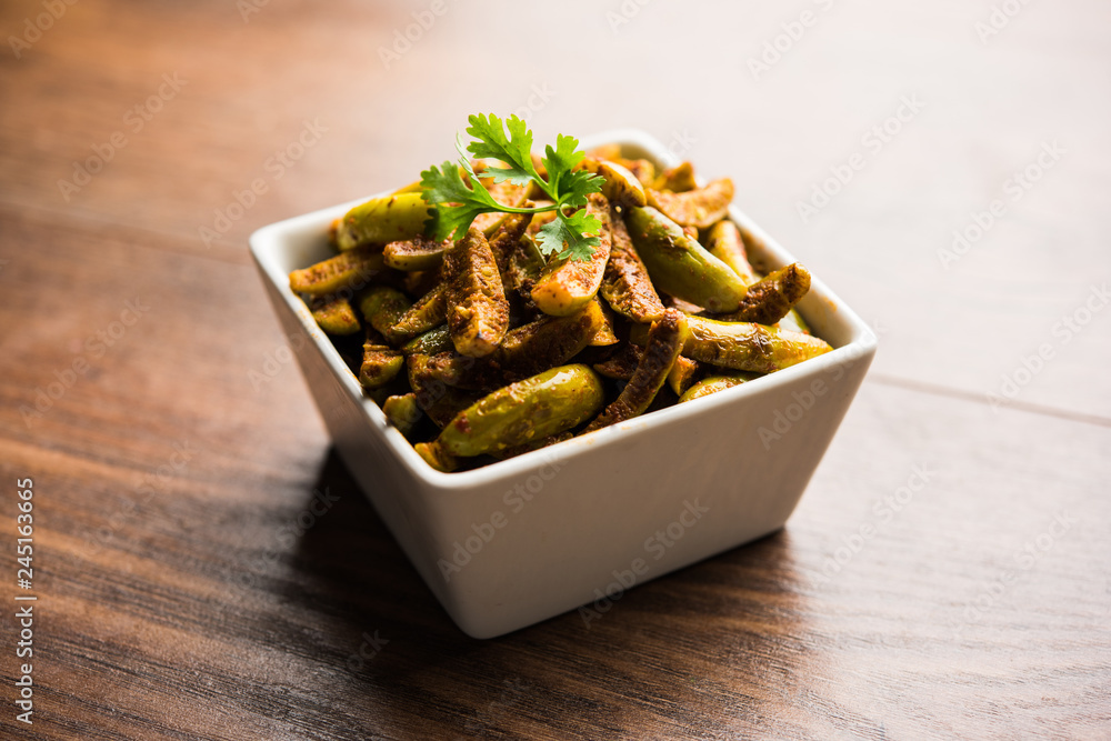 Tindora Sabzi / Tendli / tondli Fry also known as Ivy Gourd fry recipe. selective focus Tindora Sabzi / Tendli / tondli Fry also known as Ivy Gourd fry recipe. selective focus