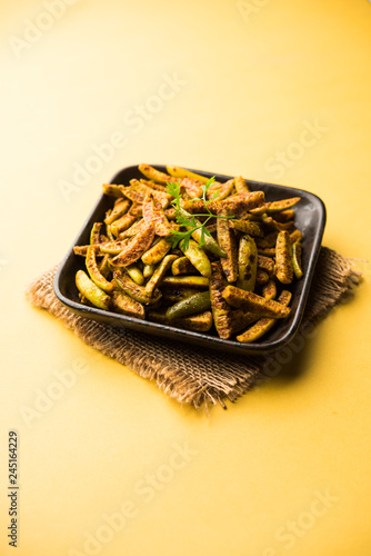 Tindora Sabzi / Tendli / tondli Fry also known as Ivy Gourd fry recipe. selective focus photo