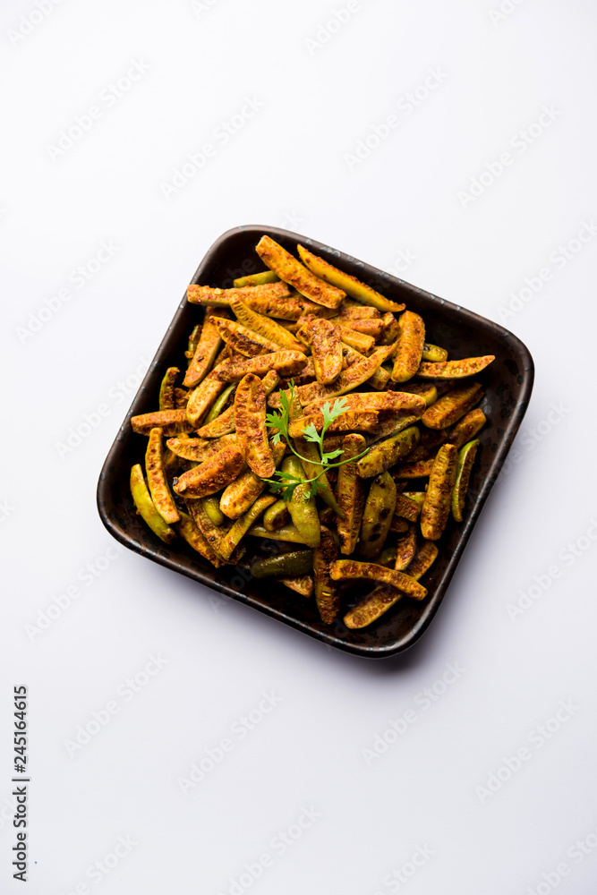 Tindora Sabzi / Tendli / tondli Fry also known as Ivy Gourd fry recipe. selective focus Tindora Sabzi / Tendli / tondli Fry also known as Ivy Gourd fry recipe. selective focus