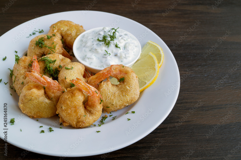 Shrimp fried in batter with Tartar sauce Shrimp fried in batter with Tartar sauce