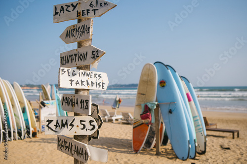 Canvas Print surfing on the beach, weligama sri lanka