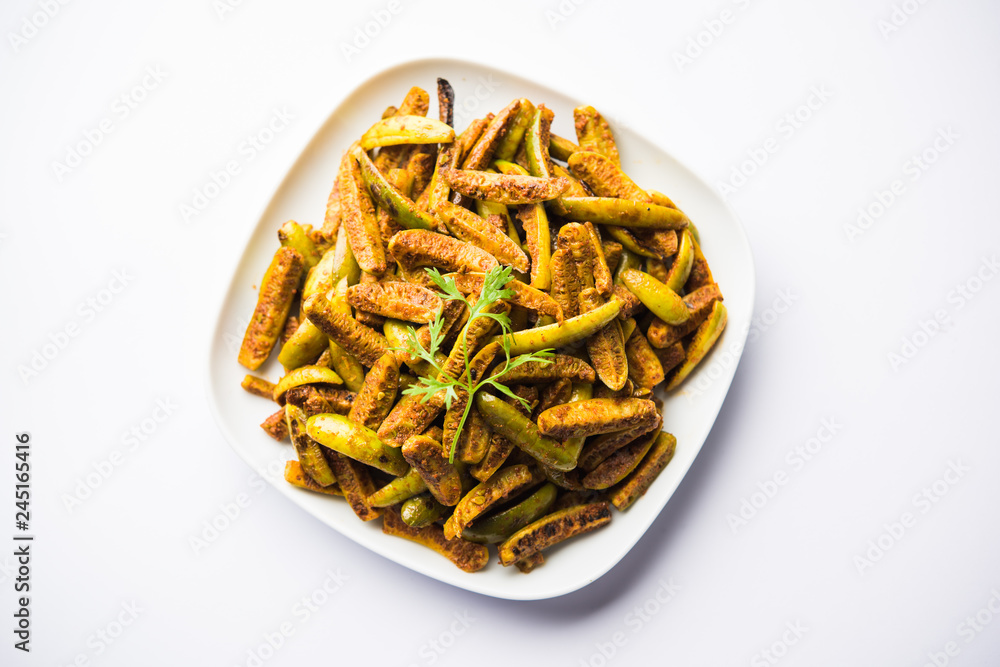 Tindora Sabzi / Tendli / tondli Fry also known as Ivy Gourd fry recipe. selective focus Tindora Sabzi / Tendli / tondli Fry also known as Ivy Gourd fry recipe. selective focus