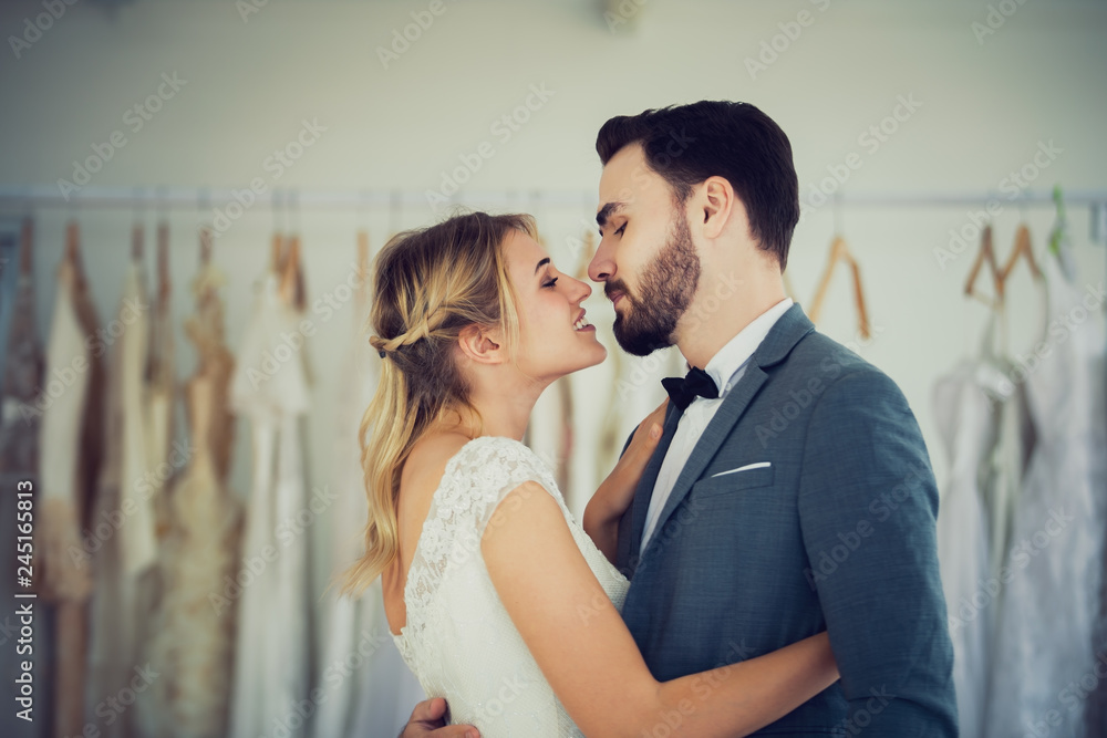 Beautiful model wedding couple in studio shop picture vintage style tone Beautiful model wedding couple in studio shop picture vintage style tone