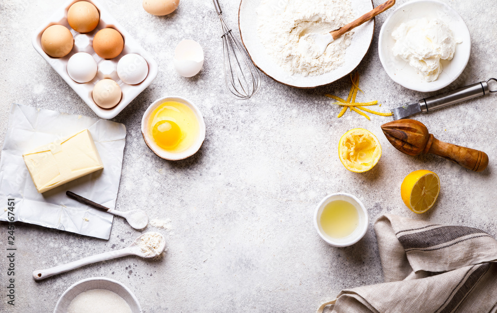 Baking background. Food accessories. Ingredients variety for cooking dough.Concept Recipe cake of a lemon and pie. Top View. Flat Lay. Copy space for Text. Baking background. Food accessories. Ingredients variety for cooking dough.Concept Recipe cake of a lemon and pie. Top View. Flat Lay. Copy space for Text.