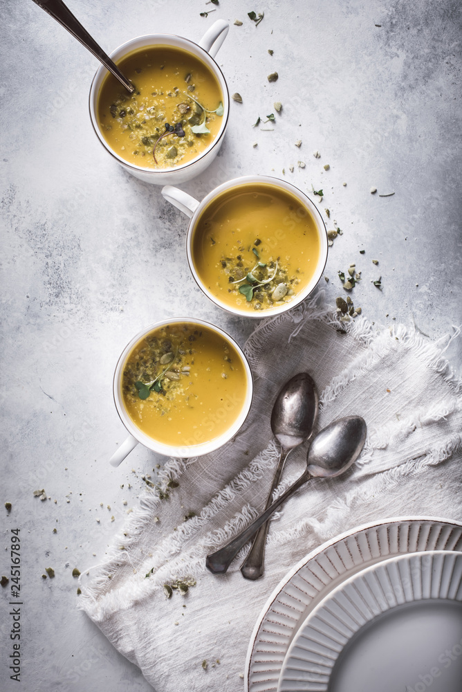 Curried Butternut Squash Soup with Crushed Pumpkin Seeds and Microgreens Curried Butternut Squash Soup with Crushed Pumpkin Seeds and Microgreens