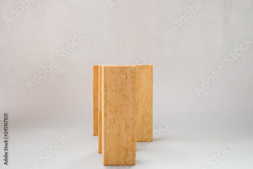 arranging wood block stacking.Business concept on gray background