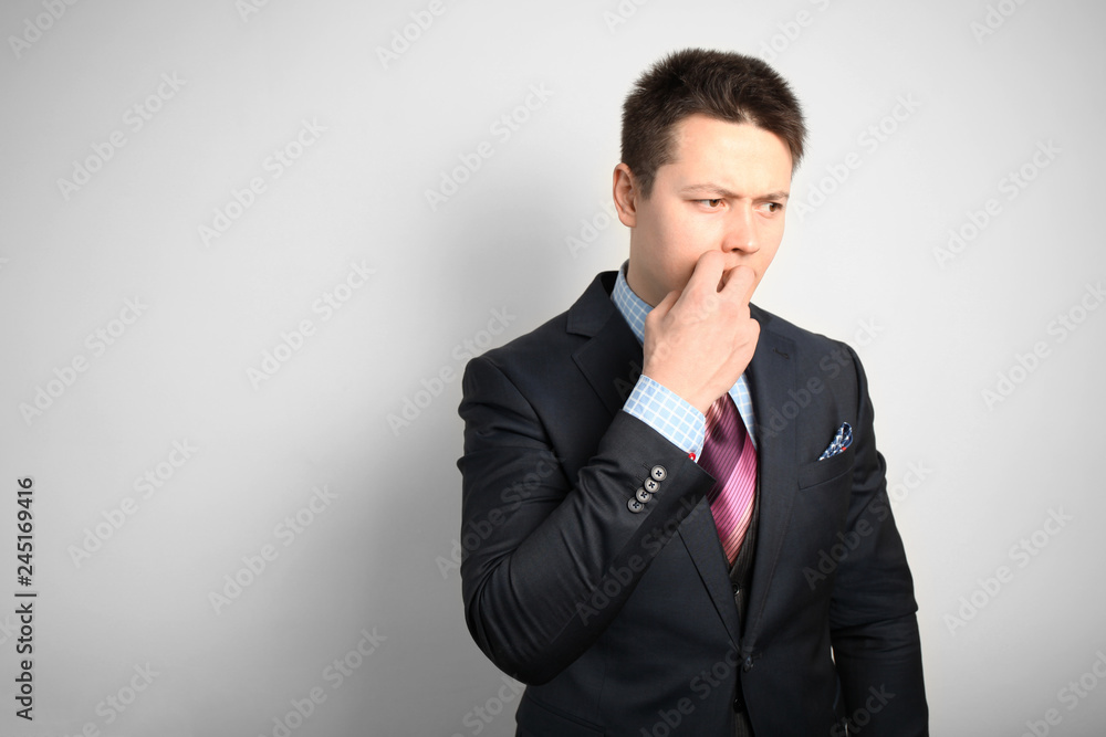 Adult businessman in suit, stress at work, in office. Experiences and collapse. Adult businessman in suit, stress at work, in office. Experiences and collapse.