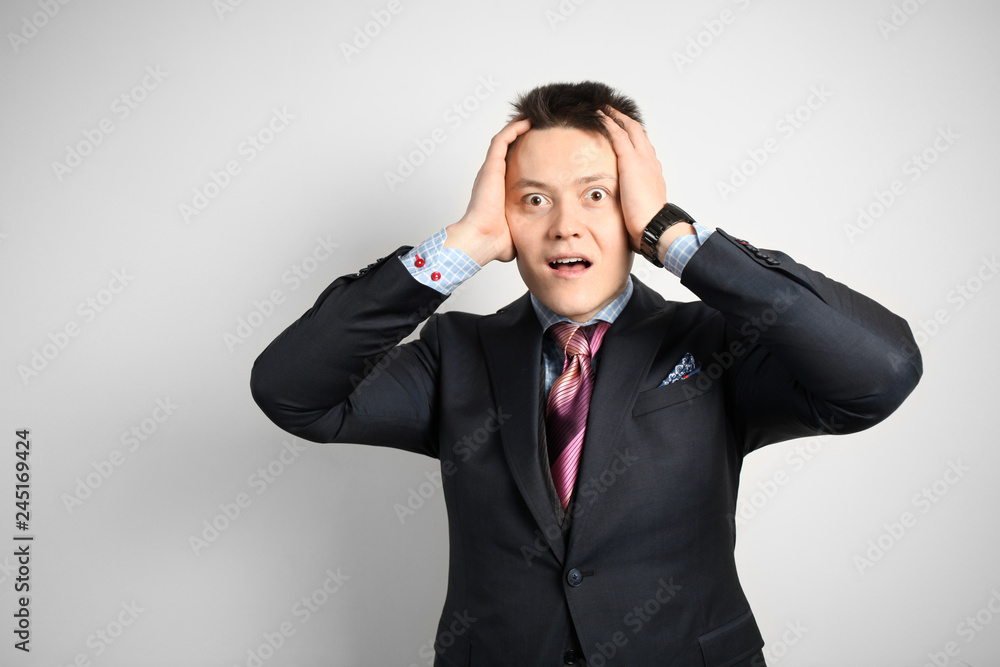 Adult businessman in suit, stress at work, in office. Experiences and collapse. Adult businessman in suit, stress at work, in office. Experiences and collapse.