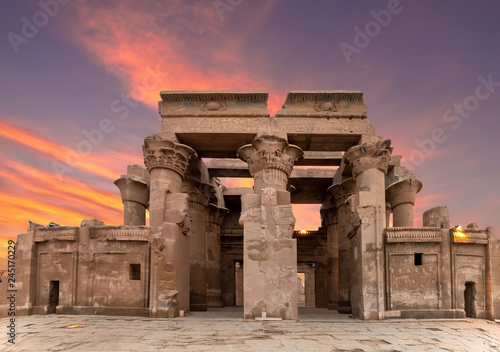 Ruins of the Temple of Kom Ombo in the Nile river at sunset, Egypt photo
