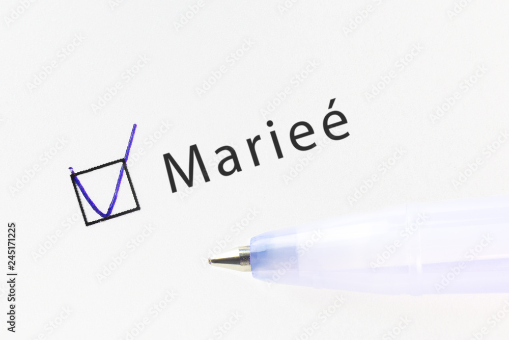 Married - checkbox with a cross on white paper with blue pen. Checklist concept Married - checkbox with a cross on white paper with blue pen. Checklist concept