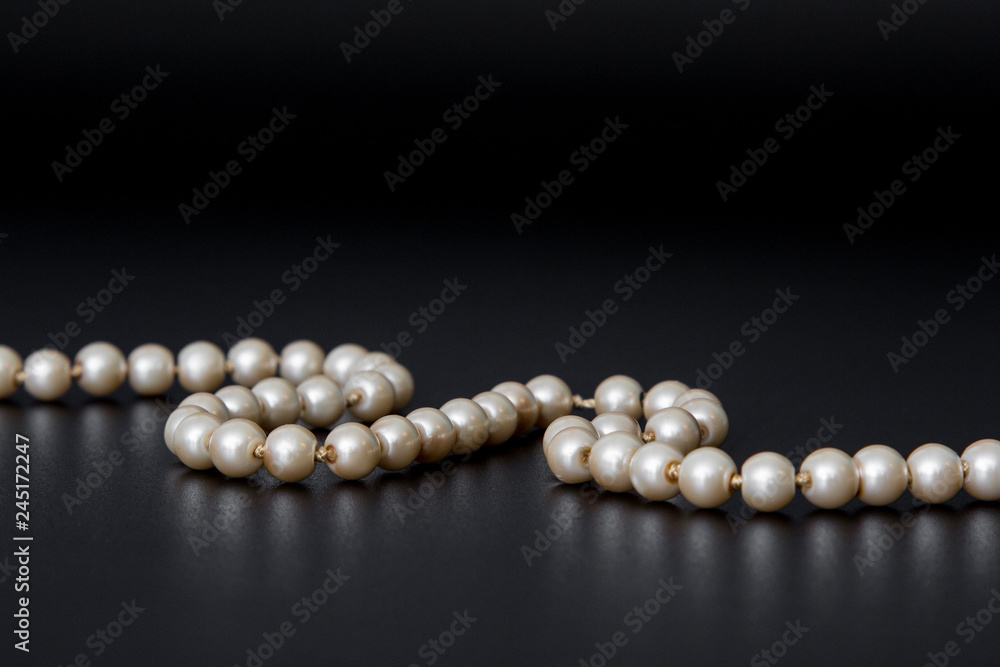 Pearls on black background Pearls on black background