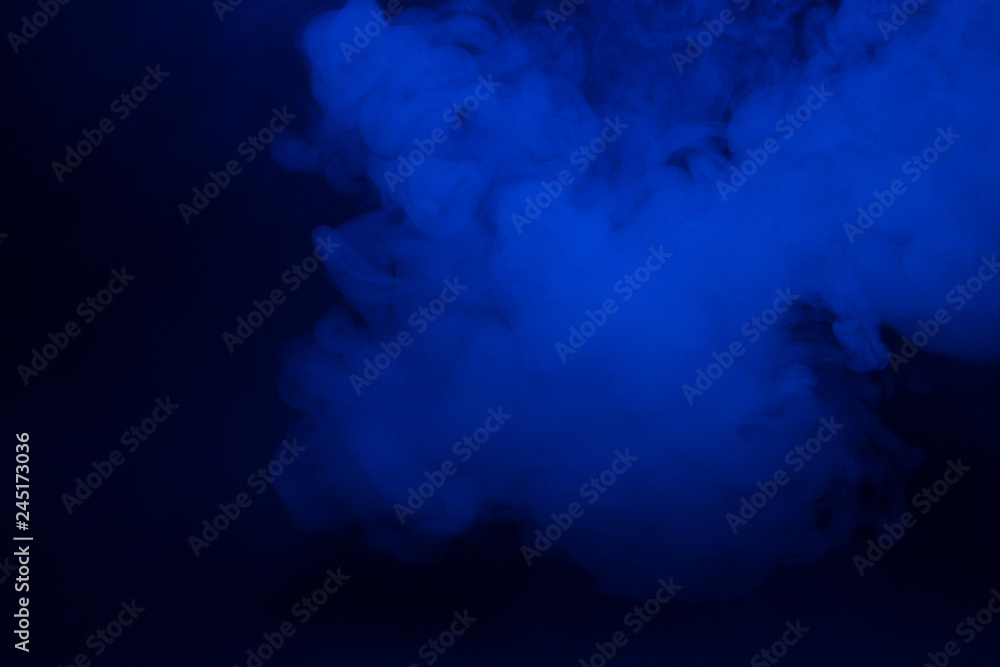 Colorful smoke close-up on a black background Colorful smoke close-up on a black background