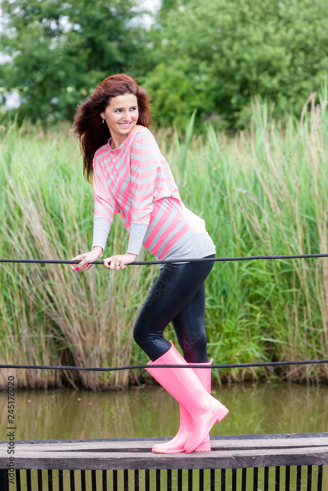 woman-wearing-rubber-boots-stock-photo-adobe-stock