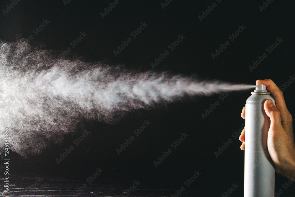 Spraying the aerosol from the spray - obrazy, fototapety, plakaty 