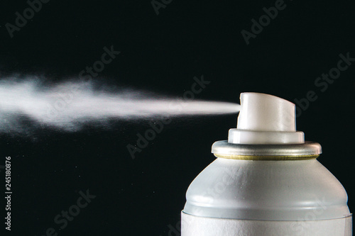 Spraying the aerosol from the spray