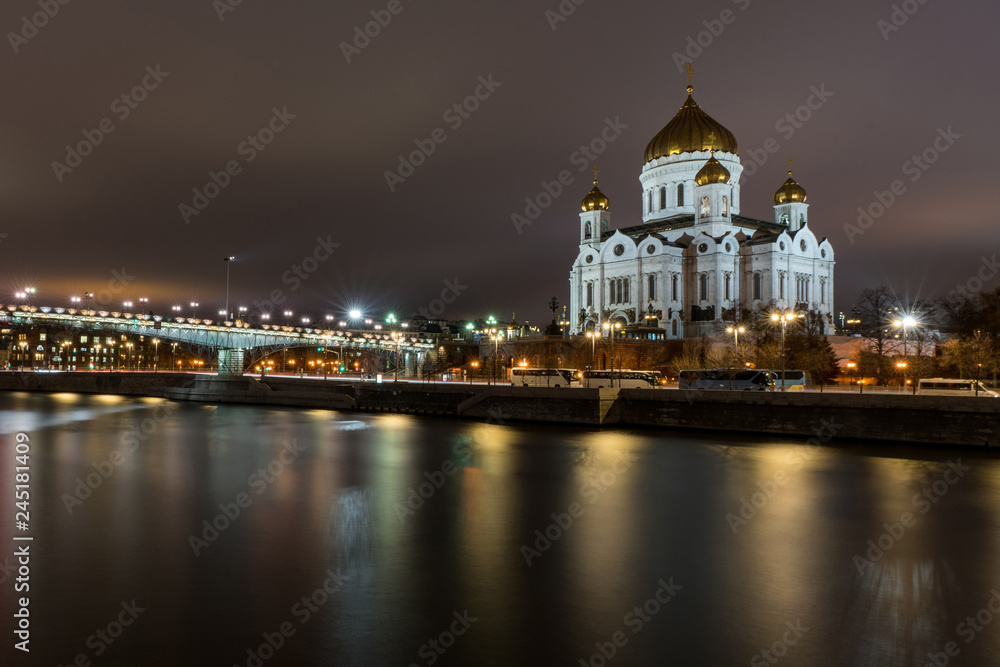 Christ the Savior Cathedral on the background of the Moscow River at night