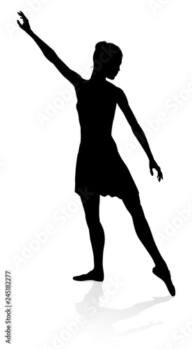 Ballet dancer in silhouette dancing in pose or position