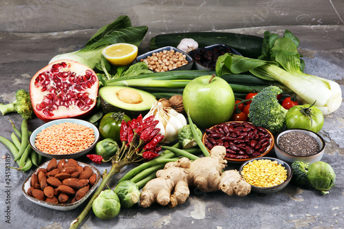 Fototapeta Naklejka Na Ścianę i Meble -  Healthy food clean eating selection. fruit, vegetable, seeds, superfood, cereals, leaf vegetable on rustic background