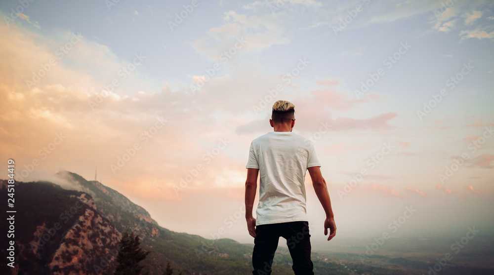 Guy on top of a mountain
