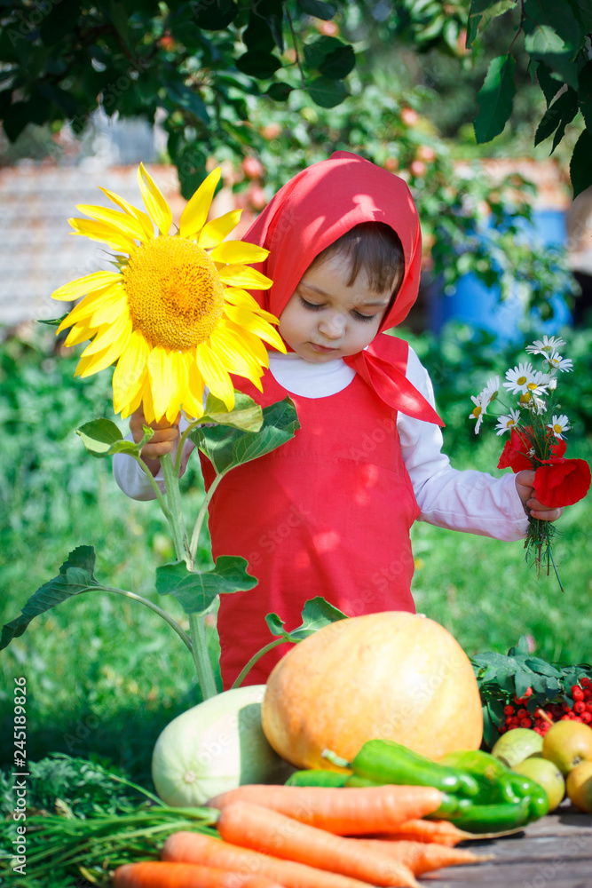 little girl in the garden little girl in the garden