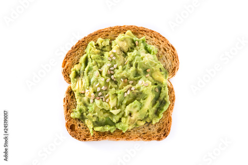 Toasted breads with avocado and sesame seeds isolated on white background. Top view