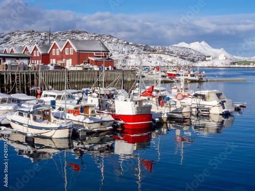 Fishing boats during the winter in Bodo harbor, Norway photo