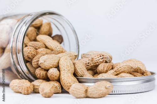 Peanuts Spilling From A Jar
