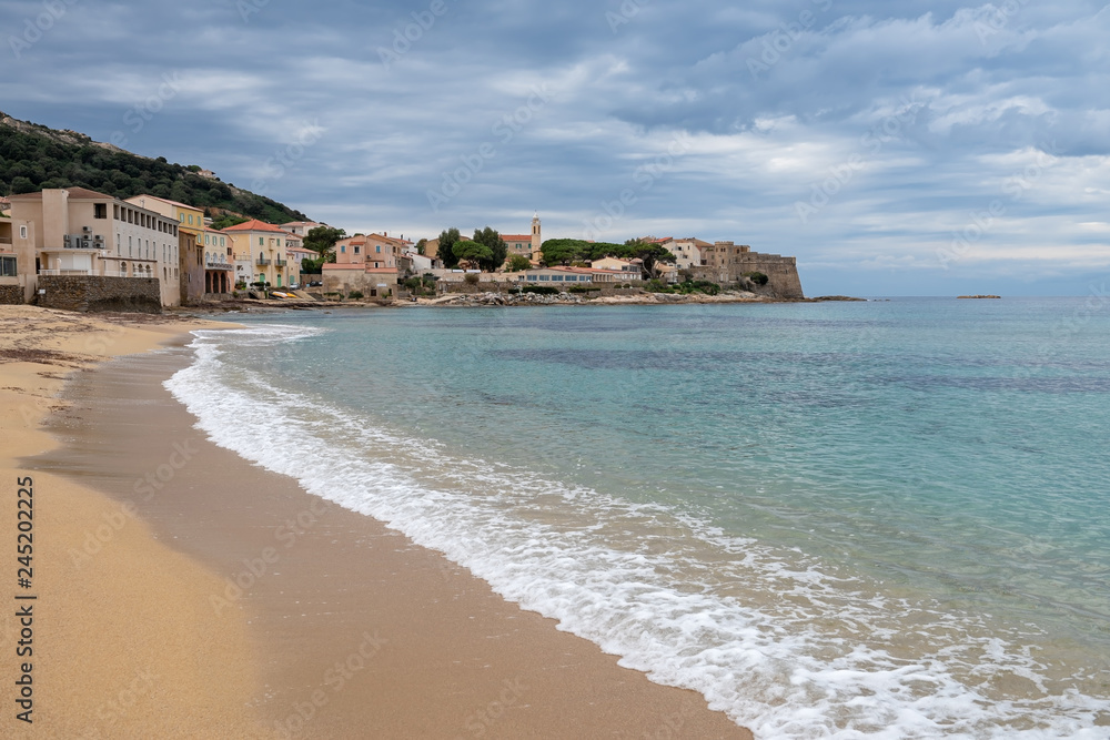 Sandy beach at the Corsican village Algajola, France