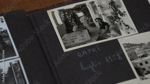 Slow motion foreground overview of some vintage photos at Capri FDV